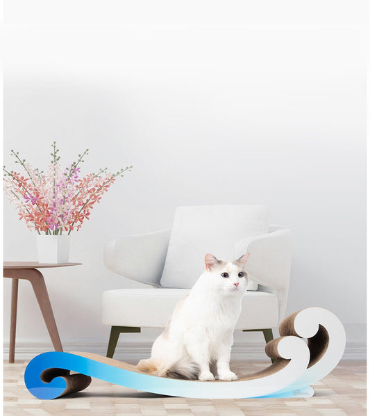 cat sitting on a modern cat scratcher lounger board