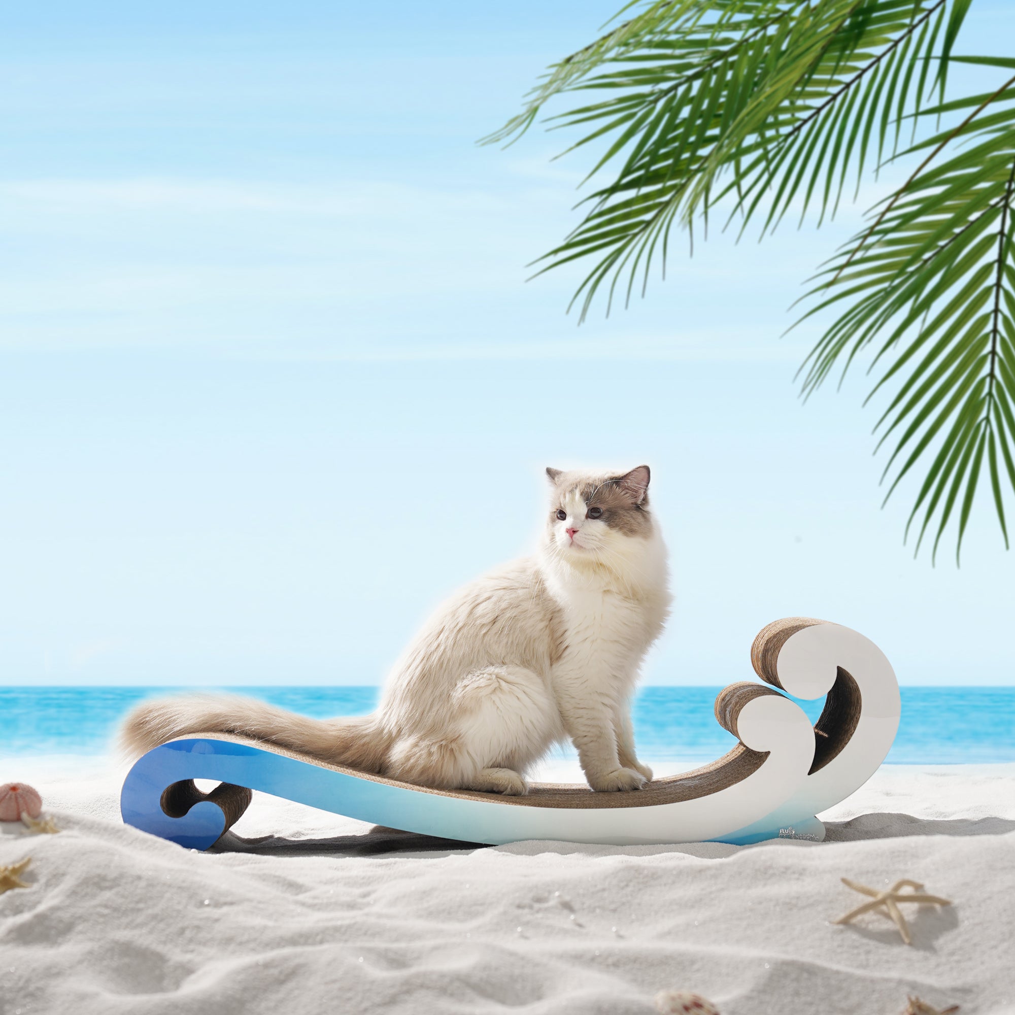A fluffy white and gray cat lounges on the Nelo Nelo - Surf Wave Cat Furniture & Cardboard Scratcher from Nelo Nelo, with a palm tree and a serene beach in the background.