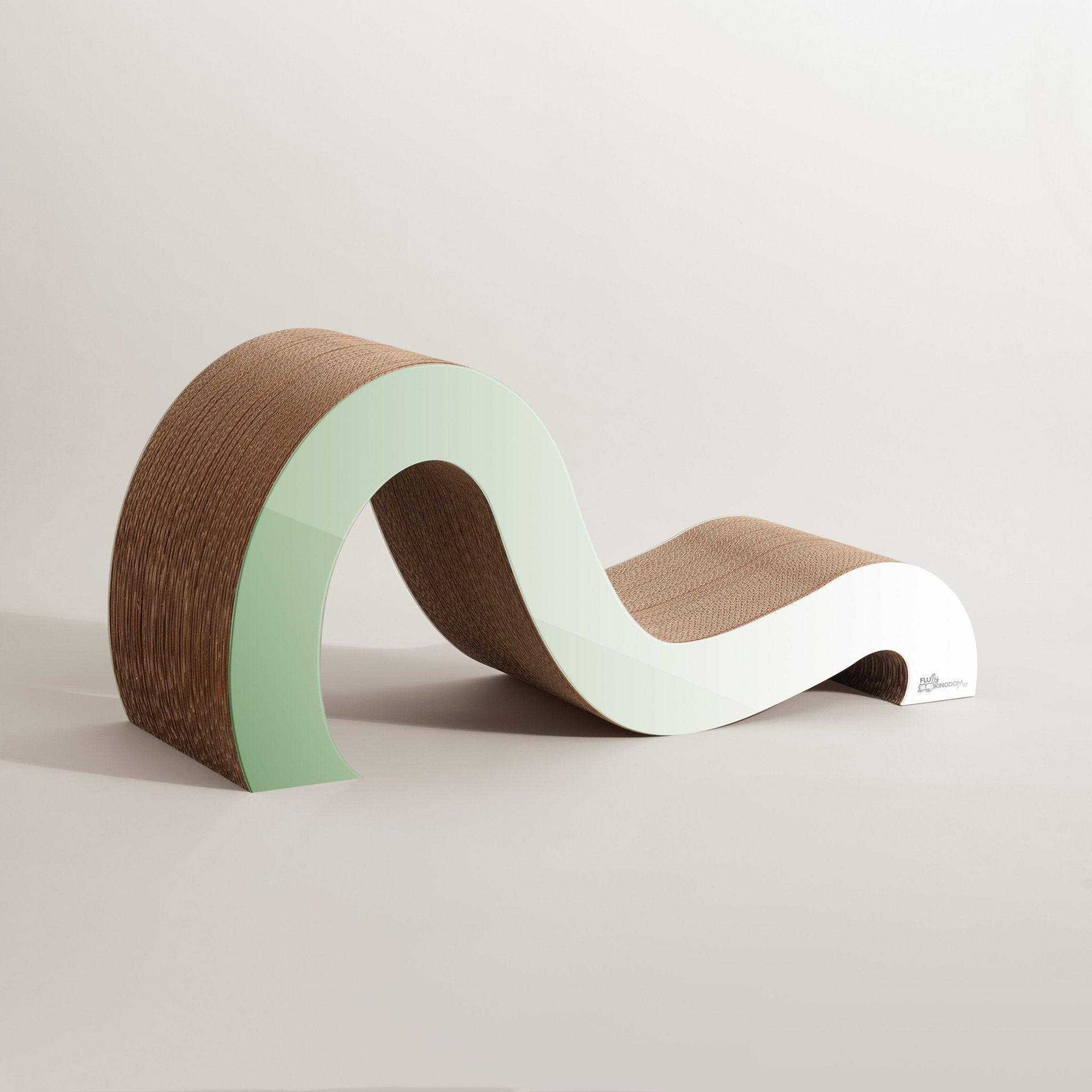Introducing the Mint Mint - Modern Cat Scratcher & Stretching Board by Mint Mint, featuring a wavy design crafted from brown and light green materials. This minimalist piece stands out against a neutral background with its pet-visible colors for added vibrancy.